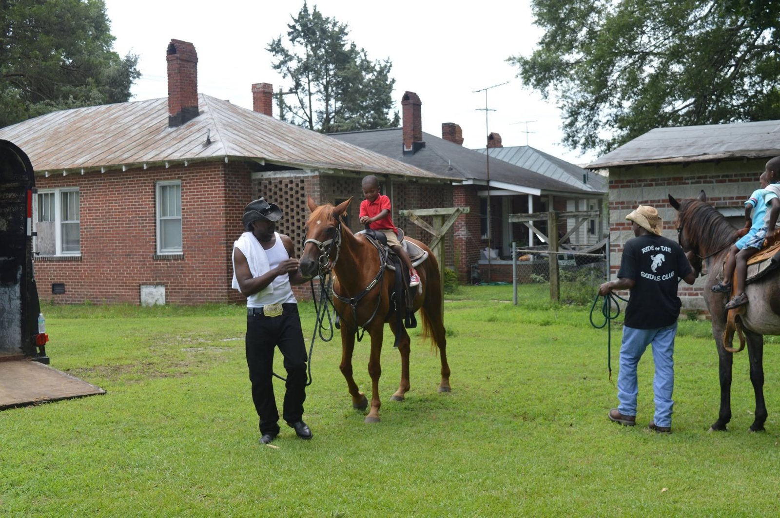 Children participating in supervised horseback riding